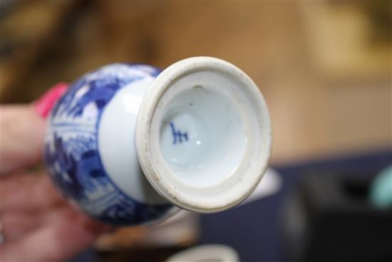 A Chinese blue and white tea bowl and saucer and two jars, Kangxi, some damage, largest diameter 11cm